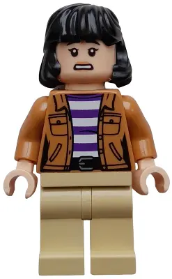 Yasmina 'Yaz' Fadoula - Medium Nougat Jacket over Dark Purple and White Striped Shirt, Tan Legs